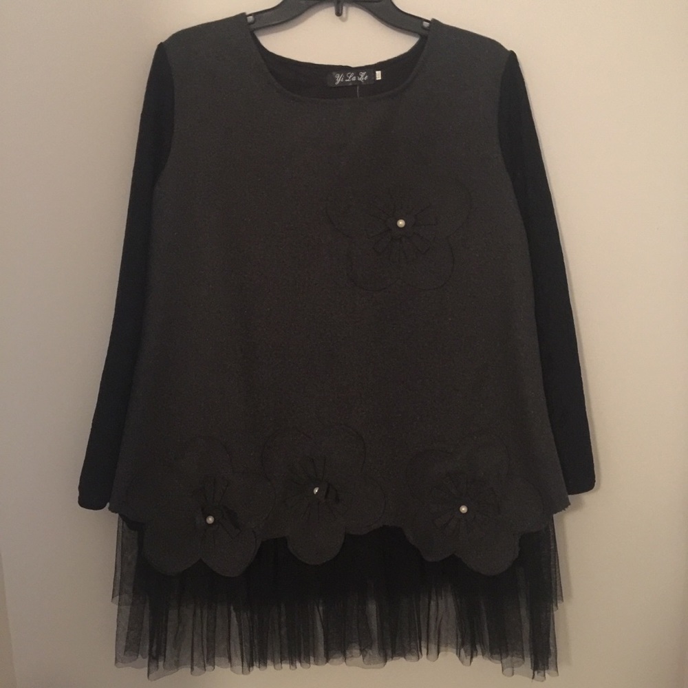 Unique, super cute top.